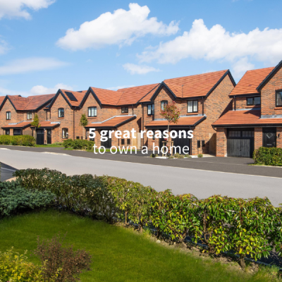 Image of new build homes, with people walking down the road in front of the houses