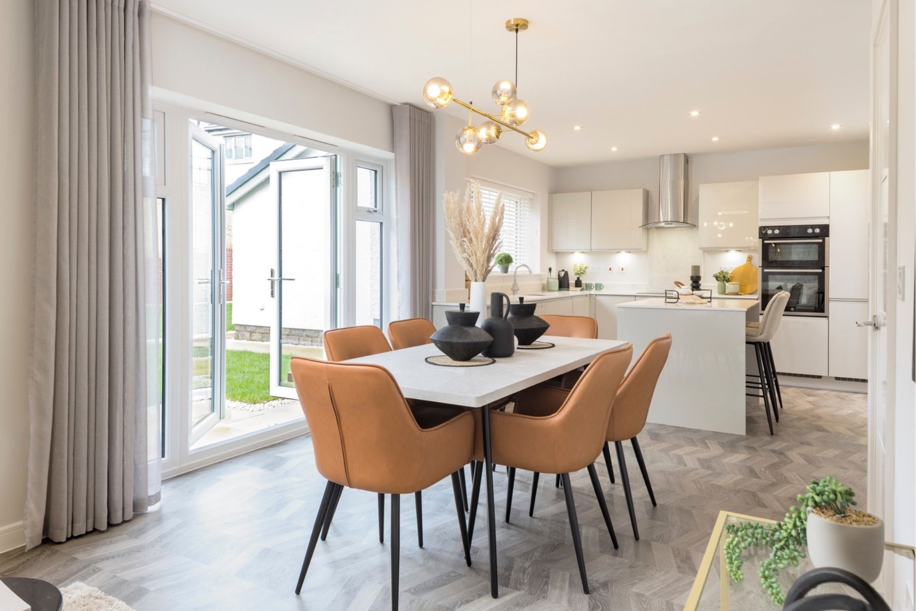 Open plan kitchen with French doors into gardenf