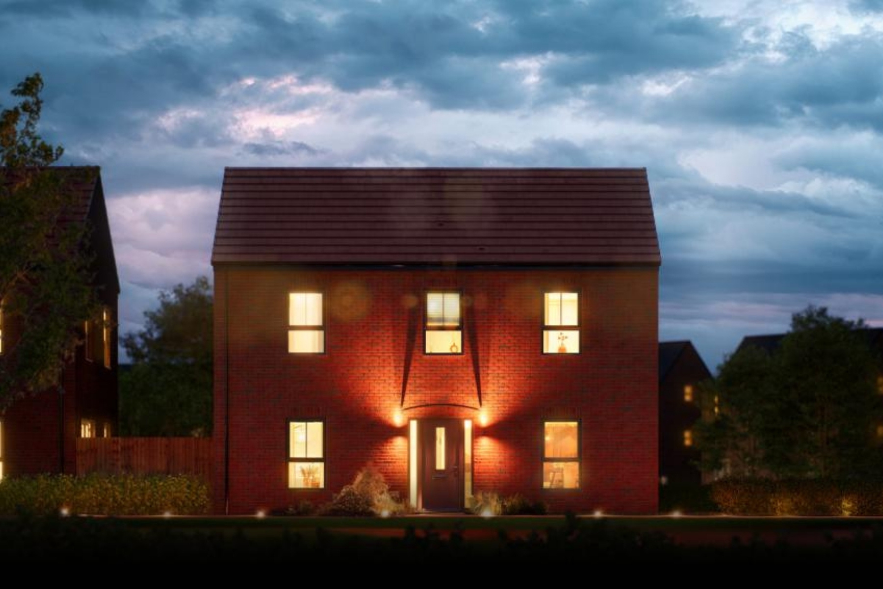 Night scene of large detached new build home at Grace by Strata Homes