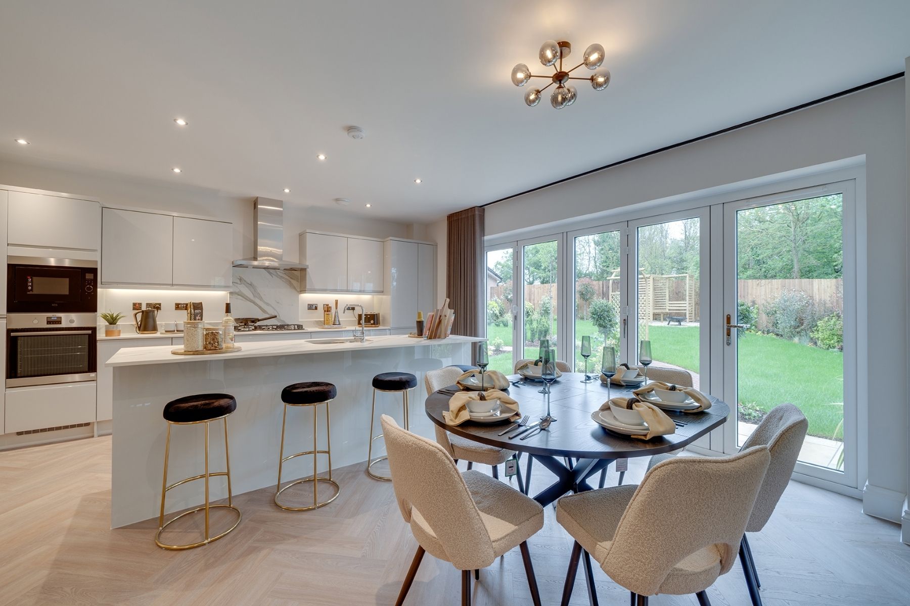 A neutrally decorated kitchen in a show home by Charles Church