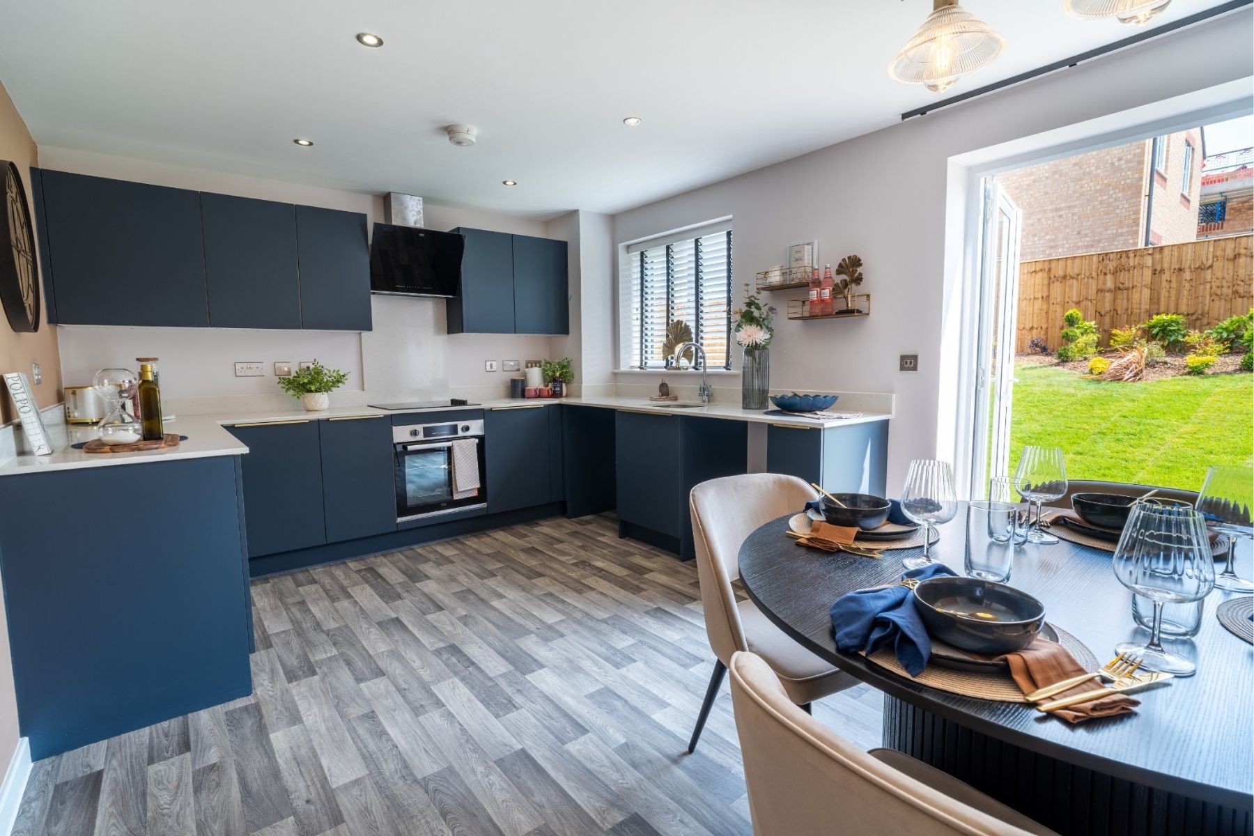 Blue kitchen at Rivers Walk in Stanley in County Durham by Gleeson