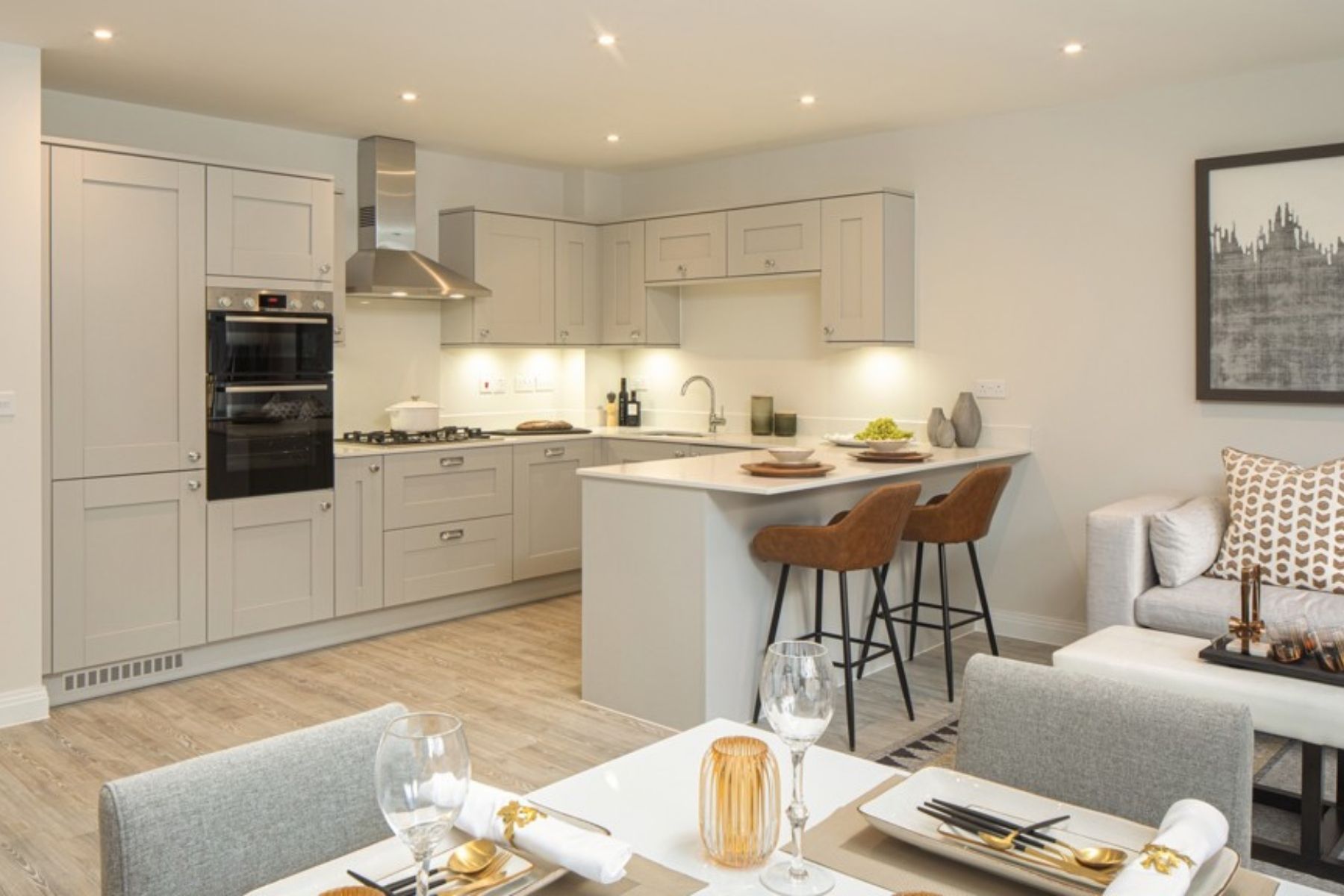 Open plan kitchen/diner areas at Kings Barton at Monarch Mead by Cala Homes